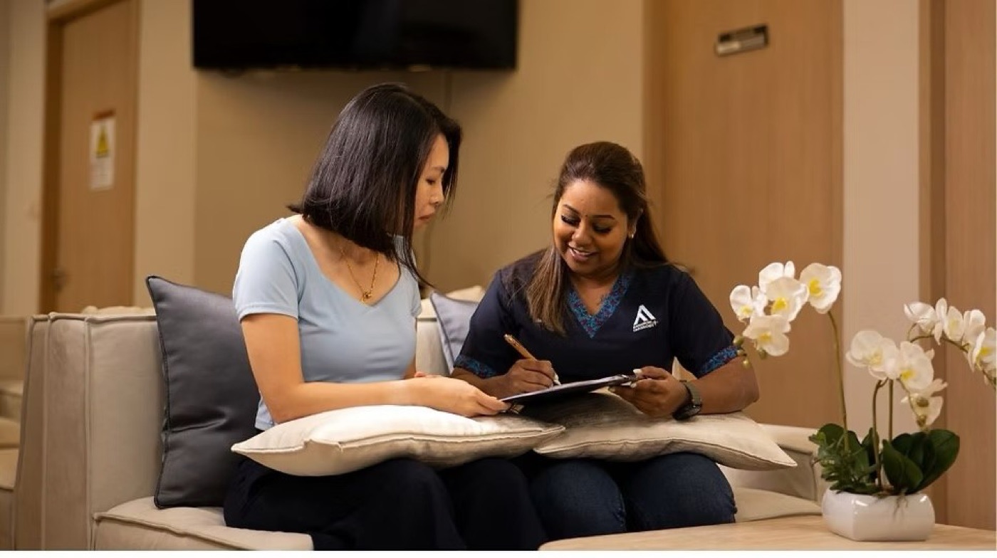 Oncologist reviewing follow-up imaging with a patient