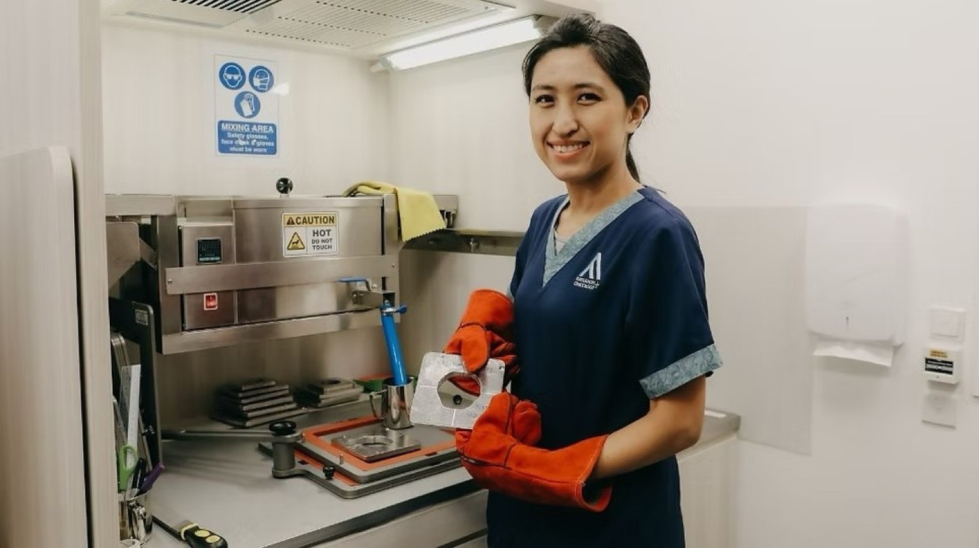 Radiation therapist running daily machine quality assurance